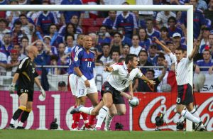 LISBON, Portugal: England midfielder Frank Lampard (C) raises his arms after scoring against France, 13 June 2004 during their opening match at the European Nations football championships at the Estadio da Luz in Lisbon. France and England are competing in Group B with Croatia and Switzerland. AFP PHOTO FRANCK FIFE (Photo credit should read FRANCK FIFE/AFP/Getty Images)
