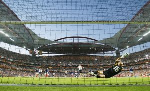 LISBON, PORTUGAL - JUNE 13: French footballer Fabien Barthez saves the penalty from England player David Beckham during the France v England Group B match in the 2004 UEFA European Football Championships at the Estadio da Luz on 13 June, 2004 in Lison, Portugal. (Photo by Ross Kinnaird/Getty Images)