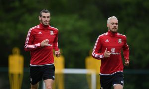 CARDIFF, WALES - JUNE 01: Aaron Ramsey (r) and Gareth Bale in action during Wales training at the Vale hotel complex on June 1, 2016 in Cardiff, Wales. (Photo by Stu Forster/Getty Images)